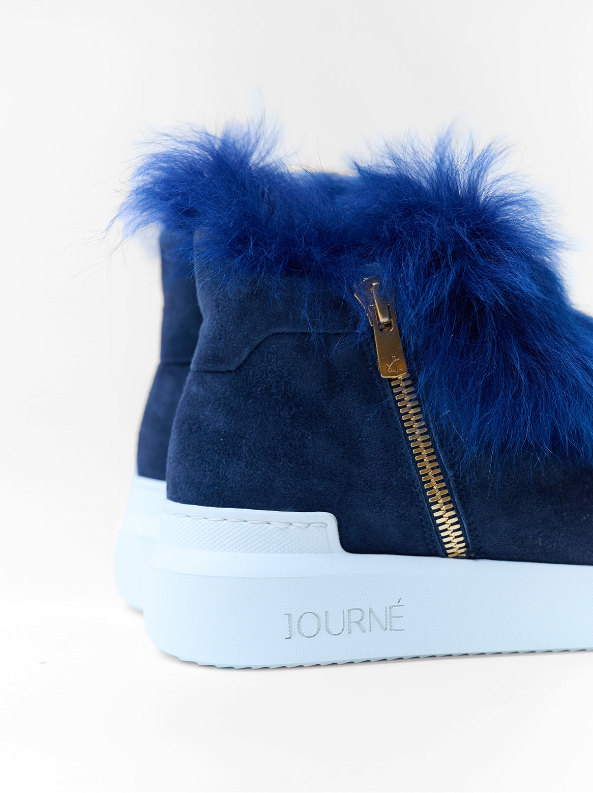 Detail: Fersenpartie mit Fell und Sohle des Grazia Chelsea in Dunkelblau